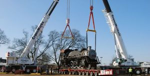 A Large Crane On The Back Of A Truck