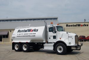 A Truck Is Parked On The Side Of A Road