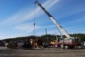 A Large Crane On The Back Of A Truck