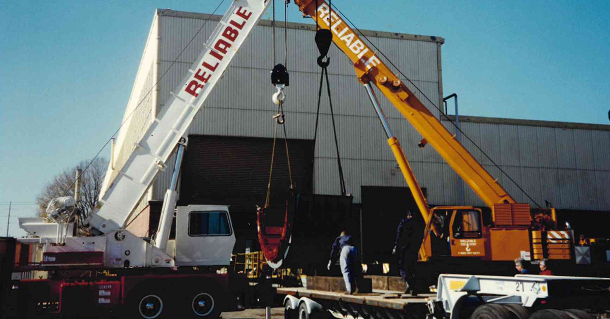 A Large Crane On The Back Of A Truck